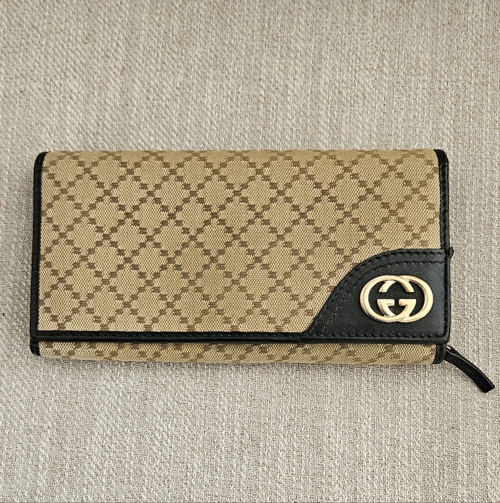 Gucci Gold and Black Logo Wallet